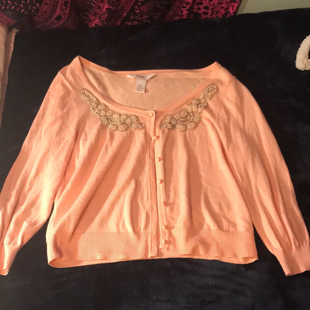 Short pink cardigan